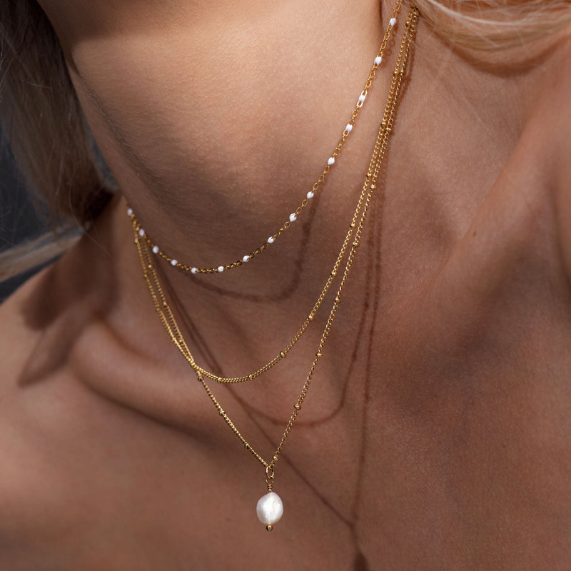 Amara Dubbel Kralhalsband - Elegant och Unikt!