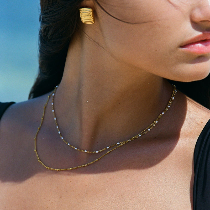 Amara Dubbel Kralhalsband - Elegant och Unikt!
